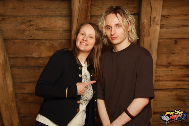 Anne with Ty Tennant. Anne's smiling and pointing at Ty, he's looking at the camera like a normal person. 